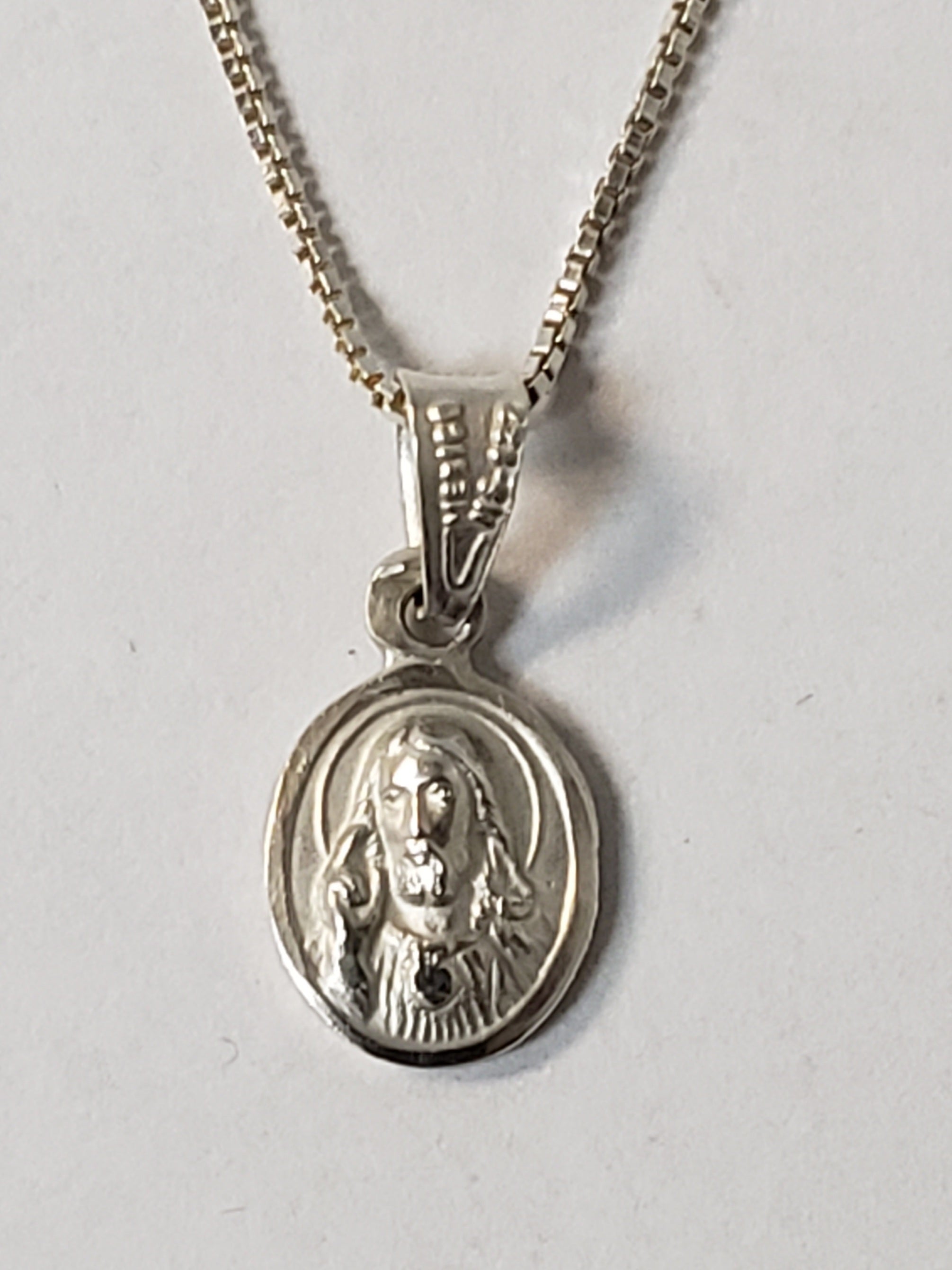 Sacred Heart of Jesus Silver Medal 3 x 1 1/2 with Silver Chain.