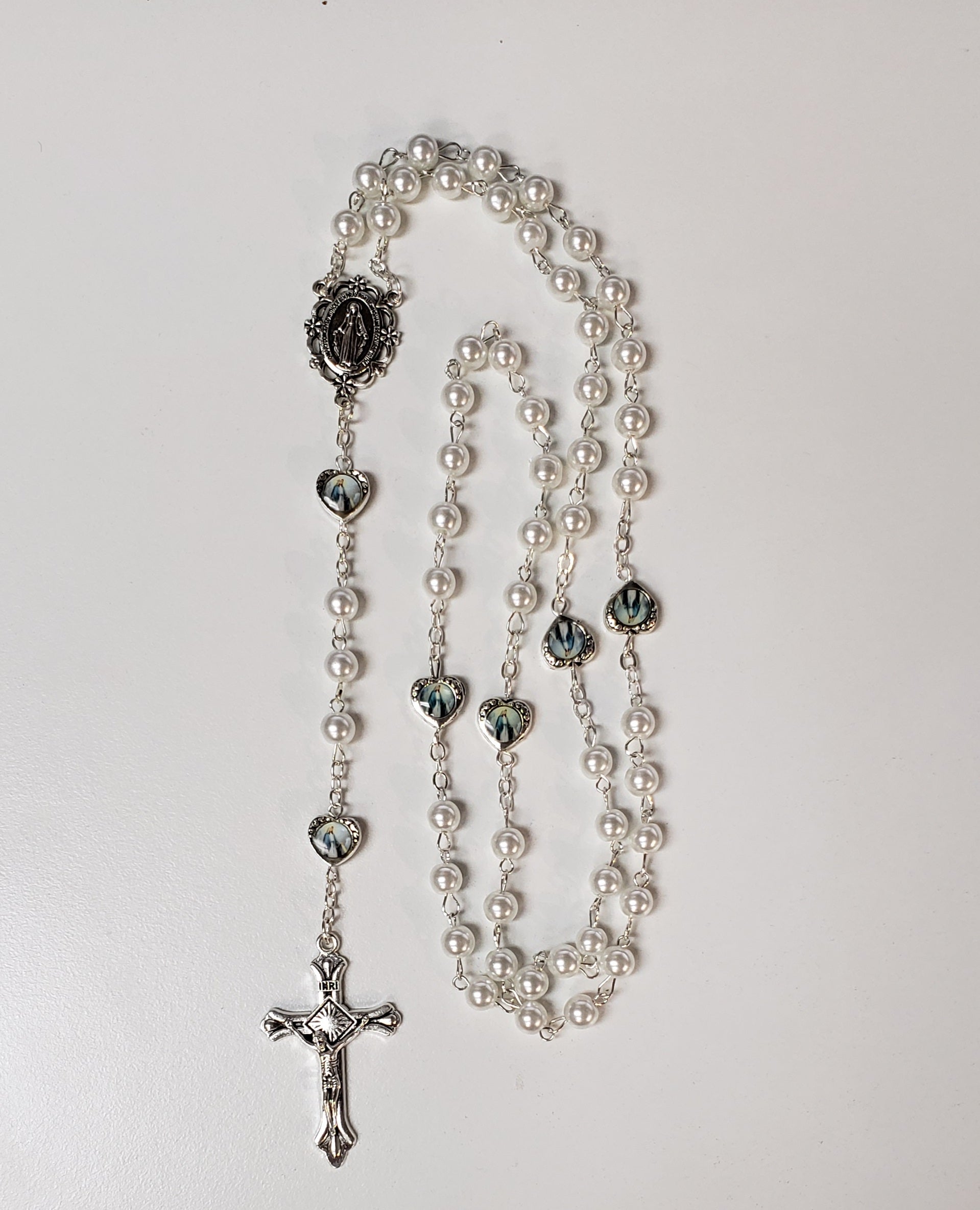 White faux pearl Rosary with small Our Lady of Grace small medals ithe misteries and Miraculous Medal in the middle
