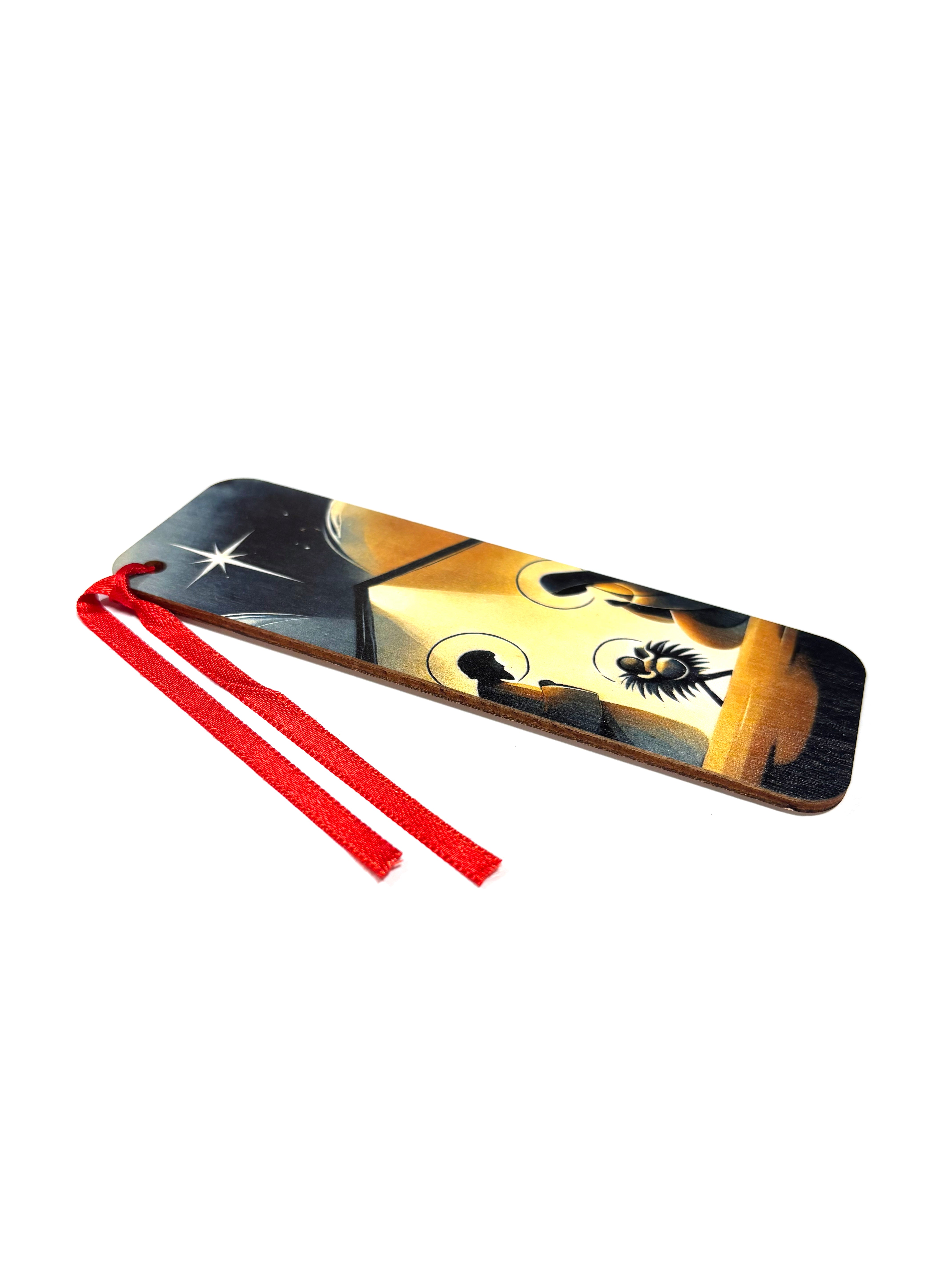 Separador de libros elaborados en madera con escena de la Natividad