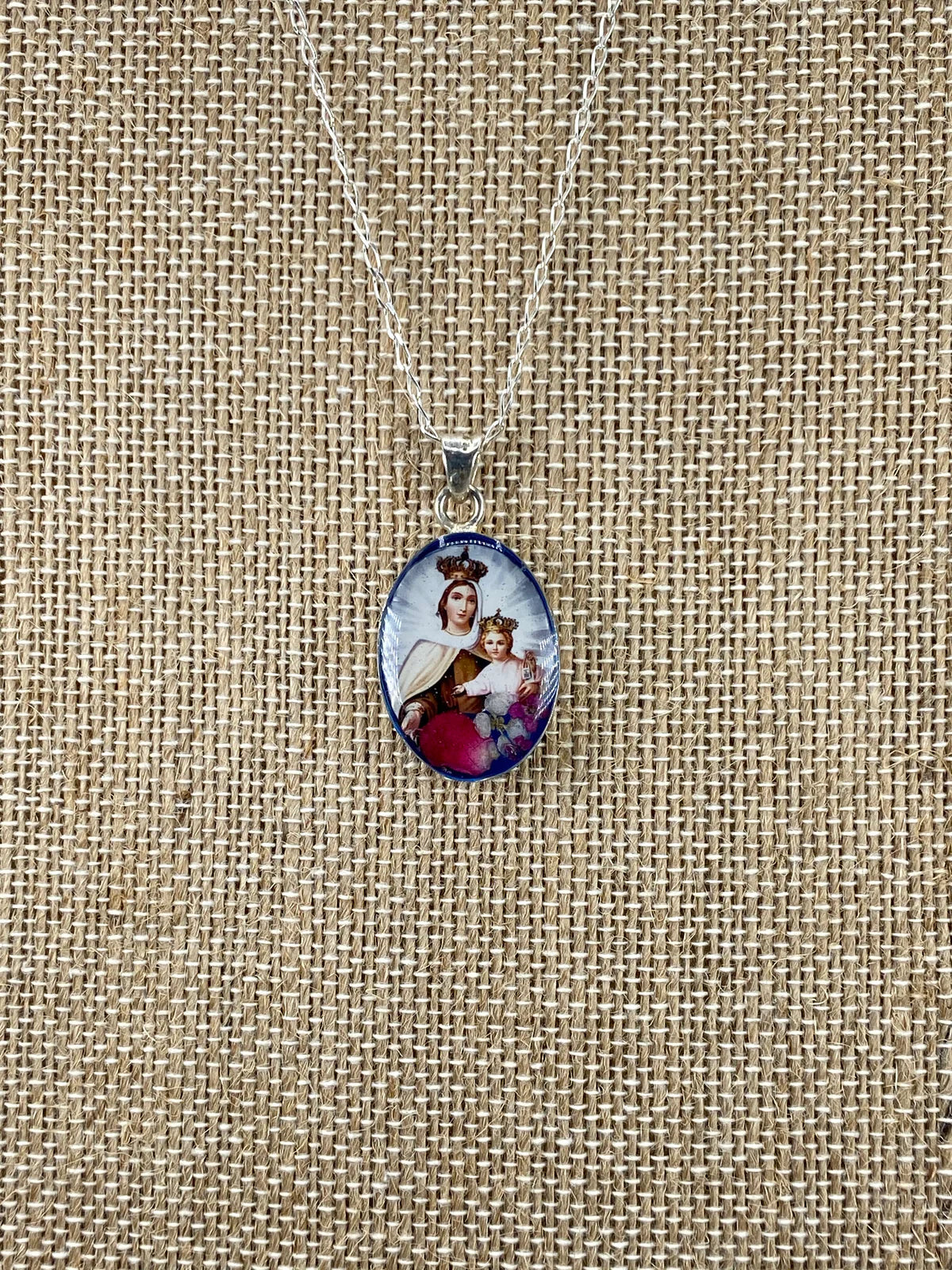 Medal whit Flowers Our Lady of Mount Carmen