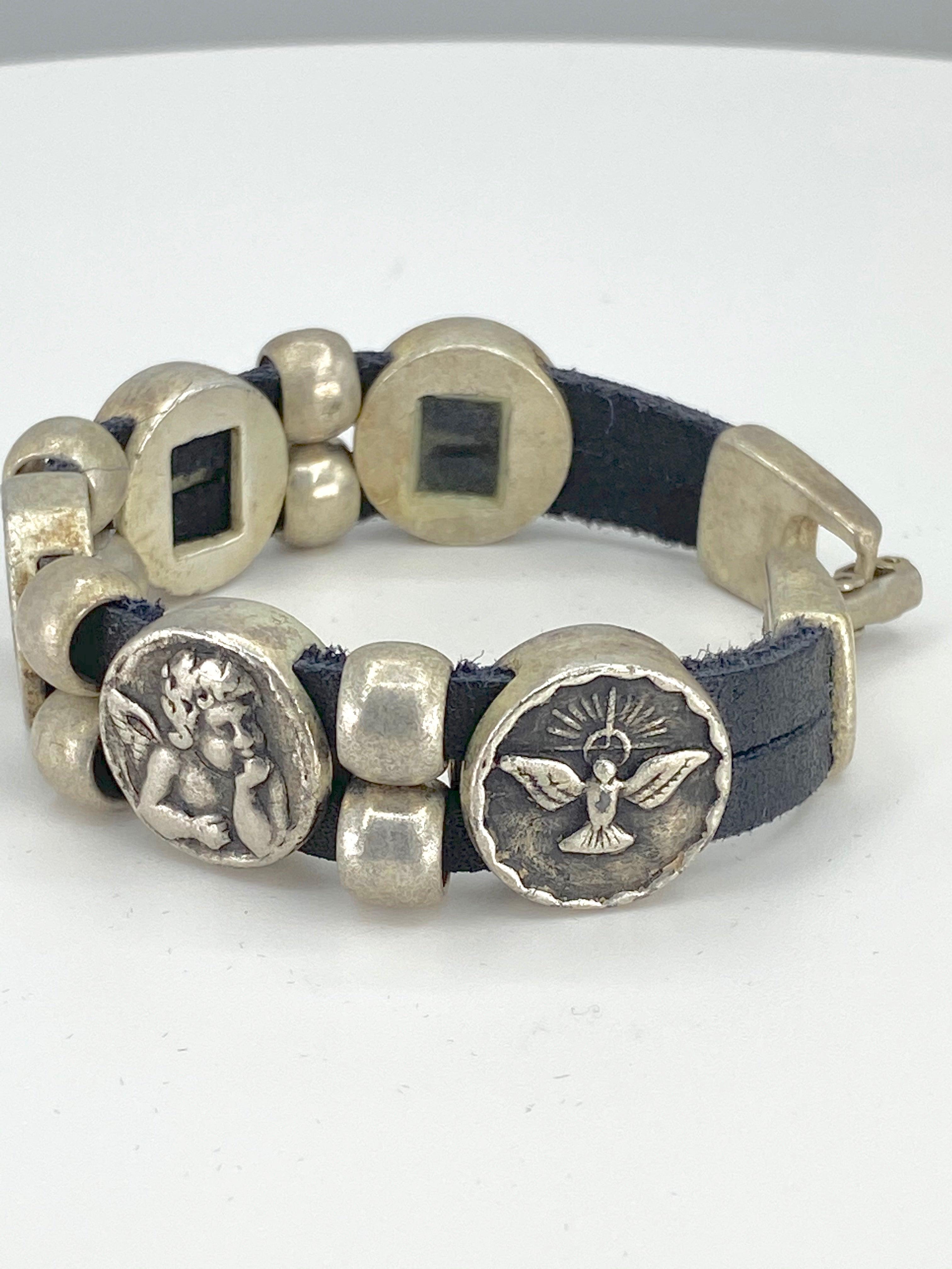 Vintage Bracelet with Double Leather Strap and Medals of The Virgen Mary, St. Benedict, Sacred Heart of Jesus, Guardian Angel, and Holy Spirit handmade jewelry by Graciela's Collection