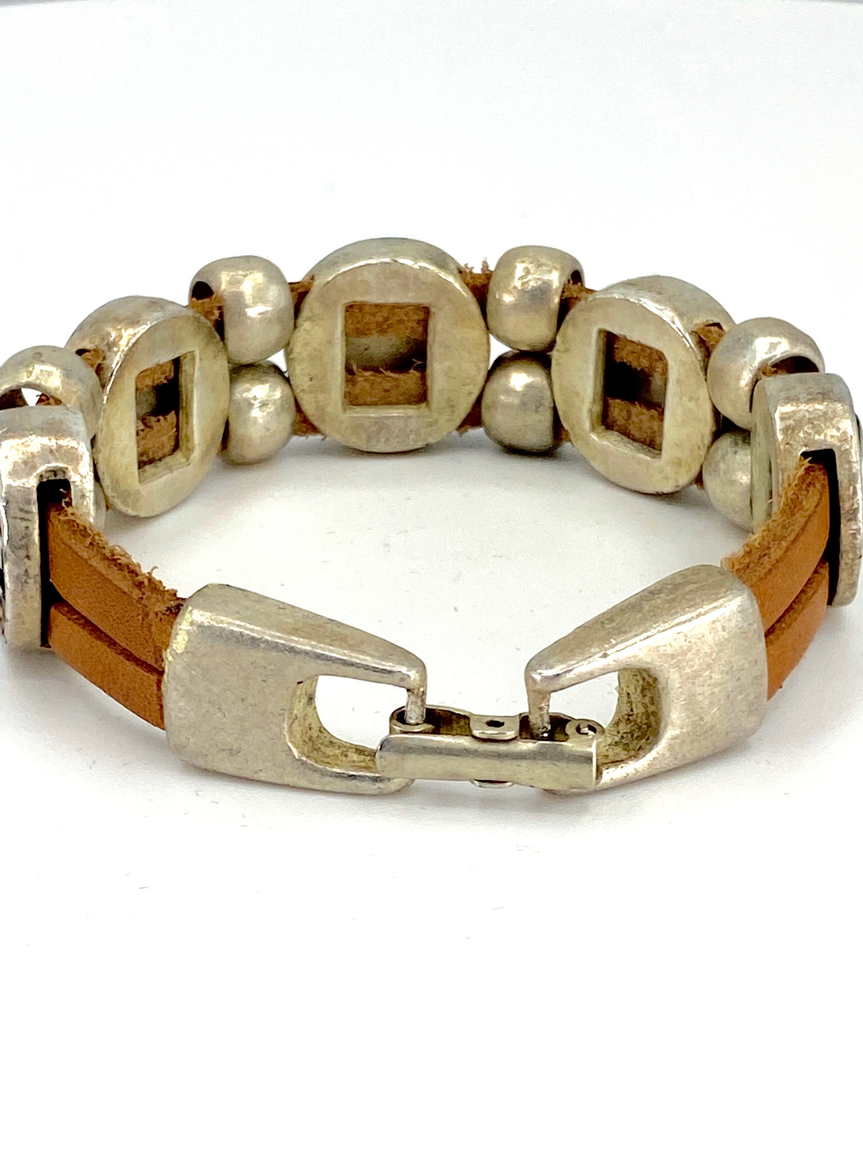 Vintage Bracelet with Double Leather Strap and Medals of The Virgen Mary, St. Benedict, Sacred Heart of Jesus, Guardian Angel, and Holy Spirit handmade jewelry by Graciela's Collection