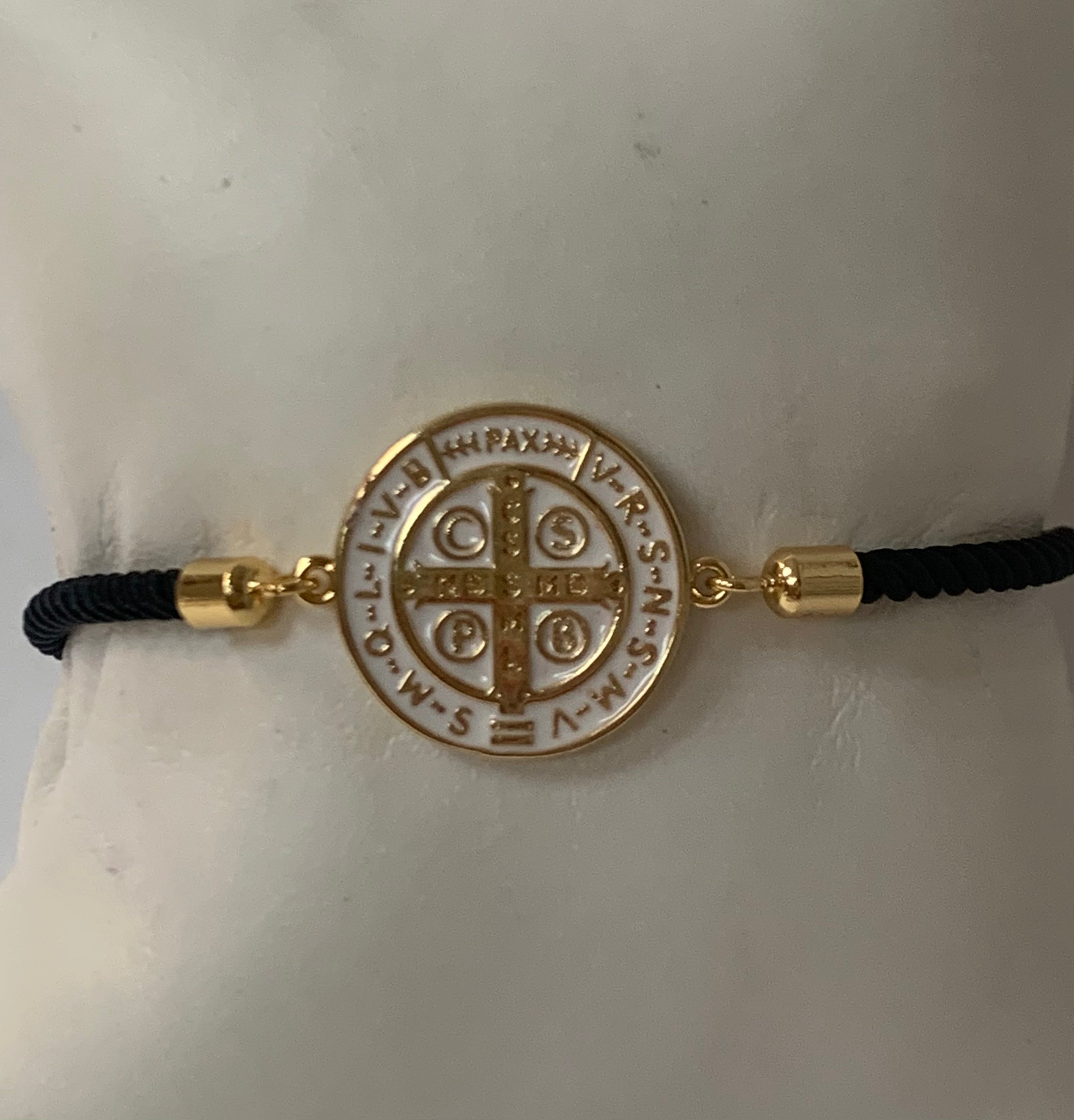Cord bracelet with St Benedict medal