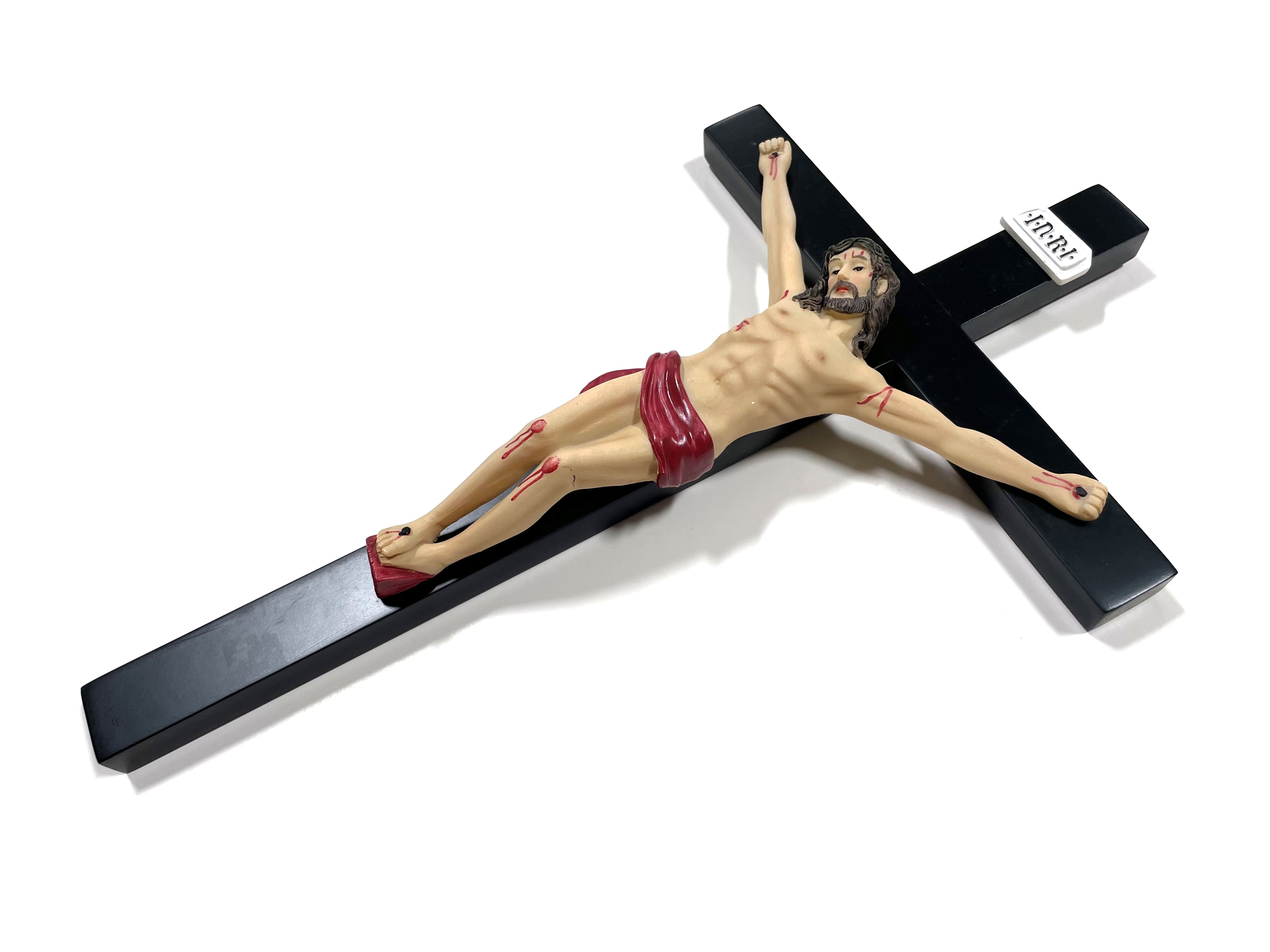 Black wooden crucifix with resin body