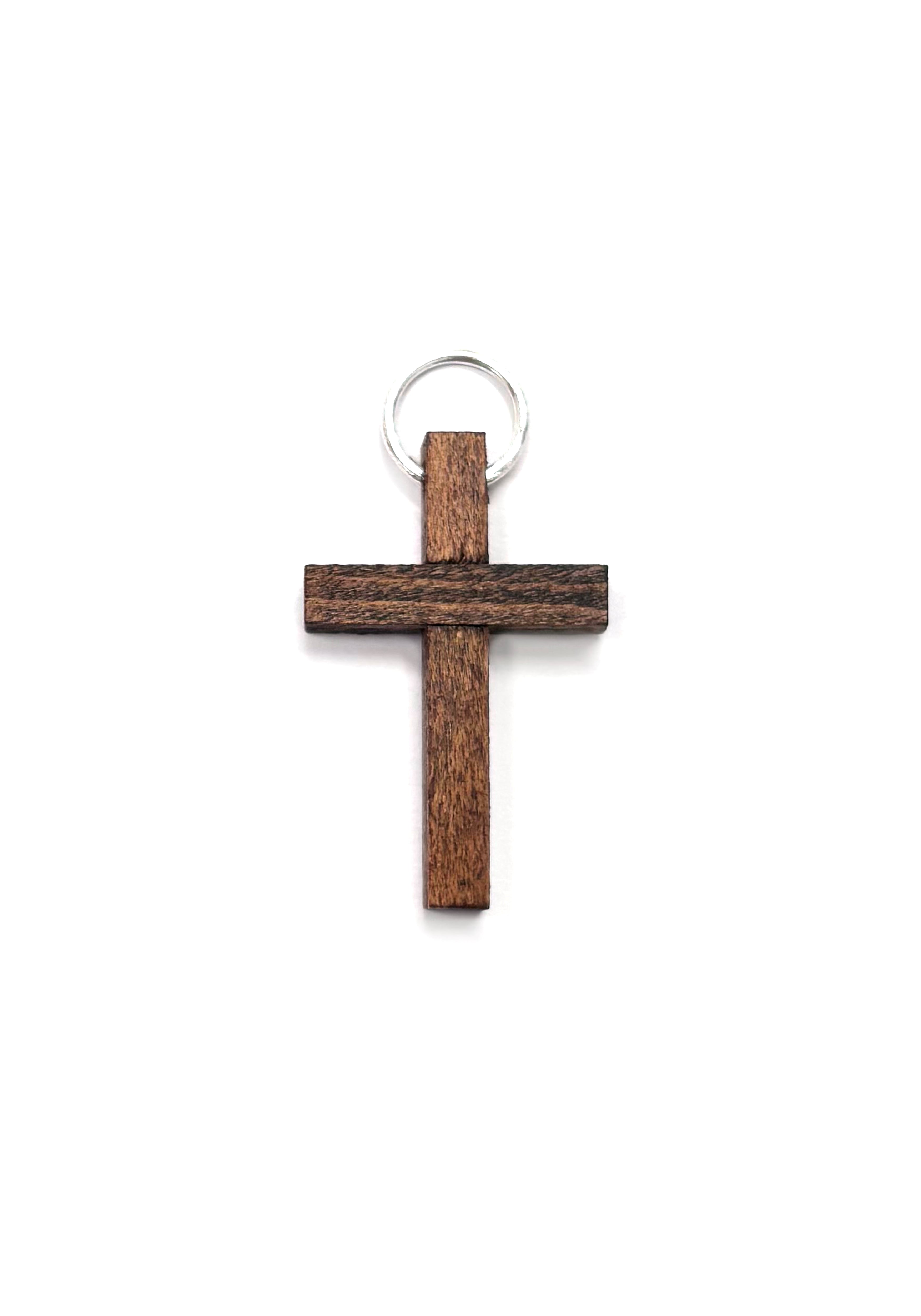 Small brown rustic wooden cross